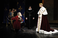 Ted van Griethuysen as Falstaff with Edward Gero (the Lord Chief Justice) and Christopher Kelly (King Henry V) flanked by the ensemble in The Shakespeare Theatre's production of William Shakespeare's  "Henry IV, Part 2," directed by Bill Alexander. Photo by Richard Termine.